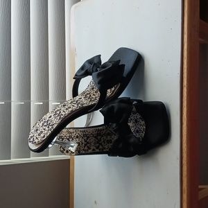 Womens sandal heels never worn I put an insole in them for me.